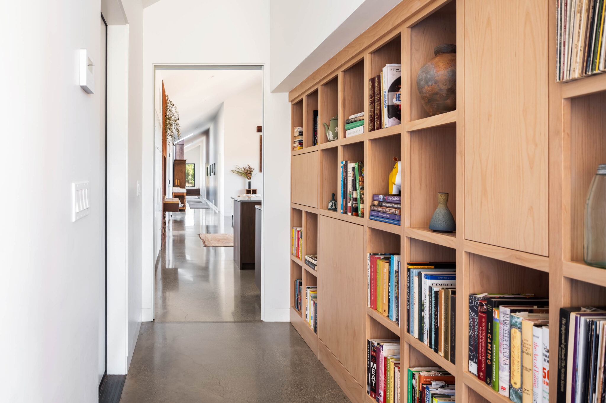 JNT custom home-hallway with shelves storage